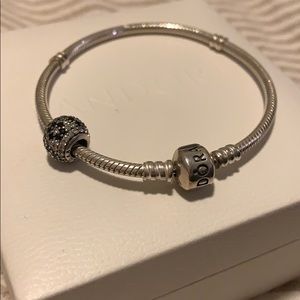 Pandora bracelet with flower charm